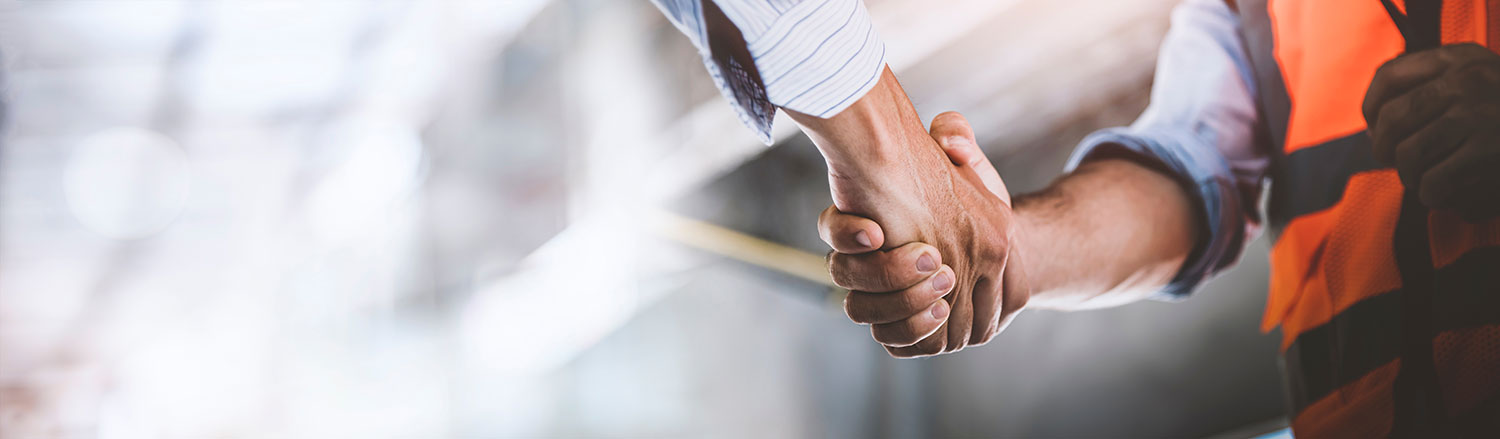 An image of two people shaking hands.